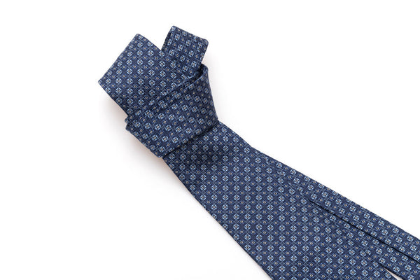 Micro-patterned blue tie in pure silk