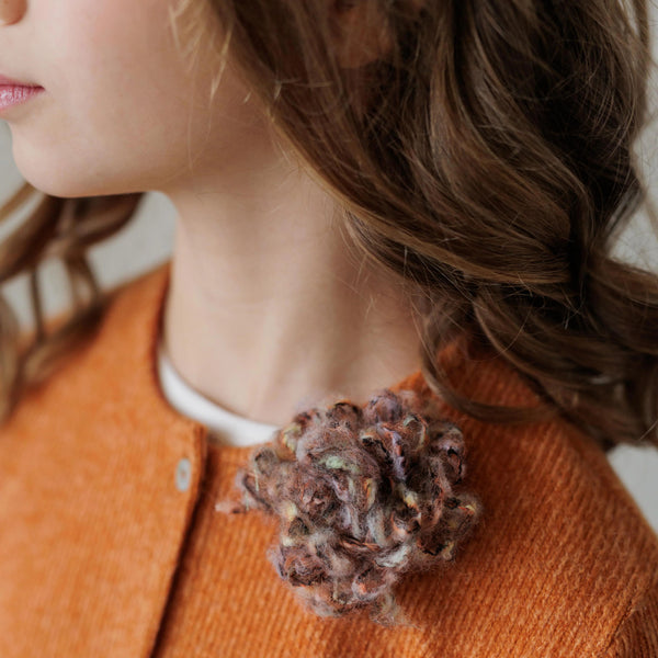 CARDIGAN SWEATER WITH POM POM