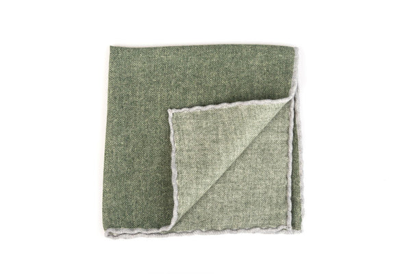 Green clutch bag with pure wool trim
