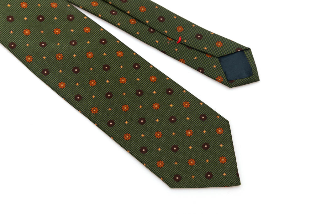 Cravatta verde con geometria in pura seta