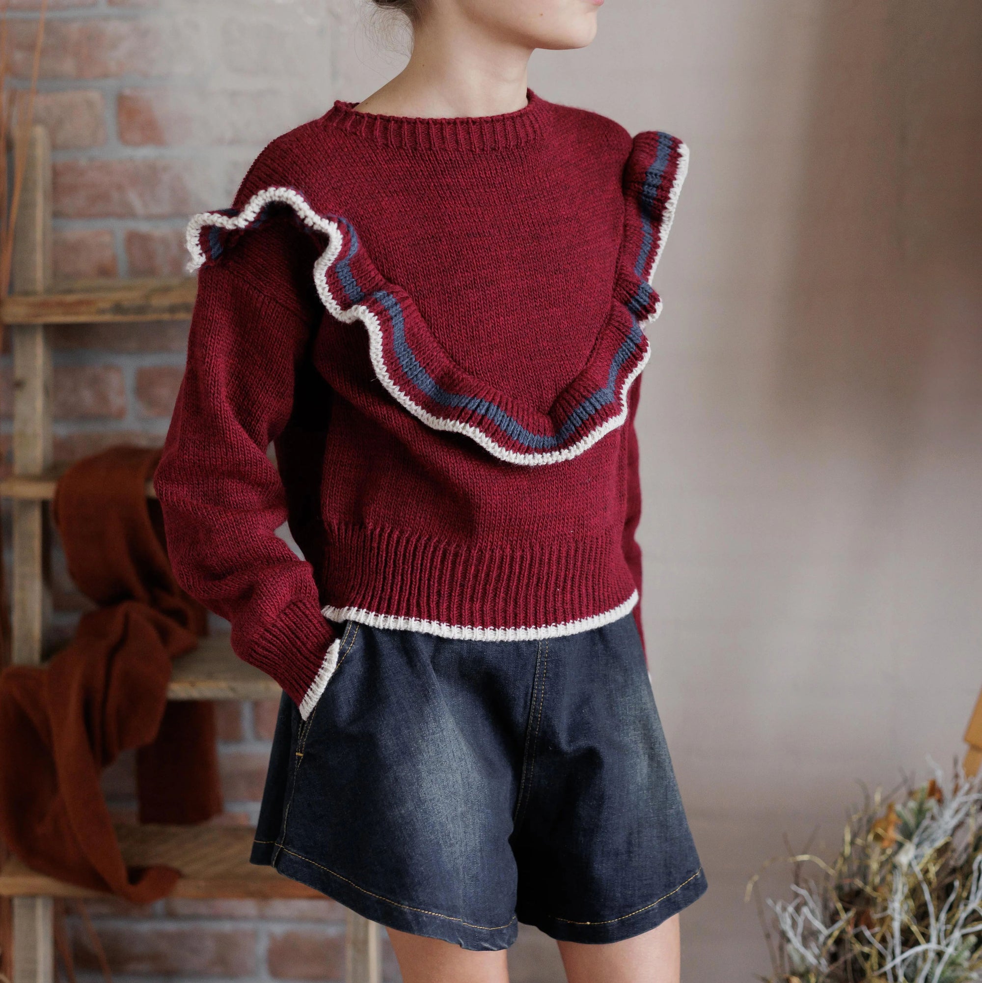 PULLOVER CON FRAPPE