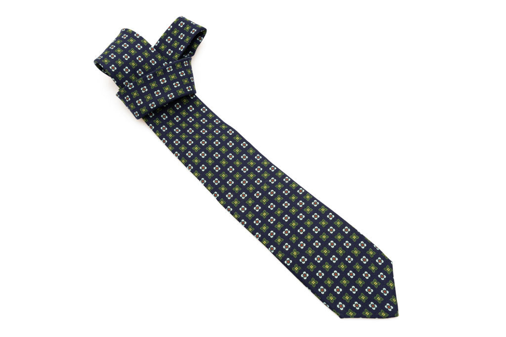 Blue base tie with geometric pattern pure wool