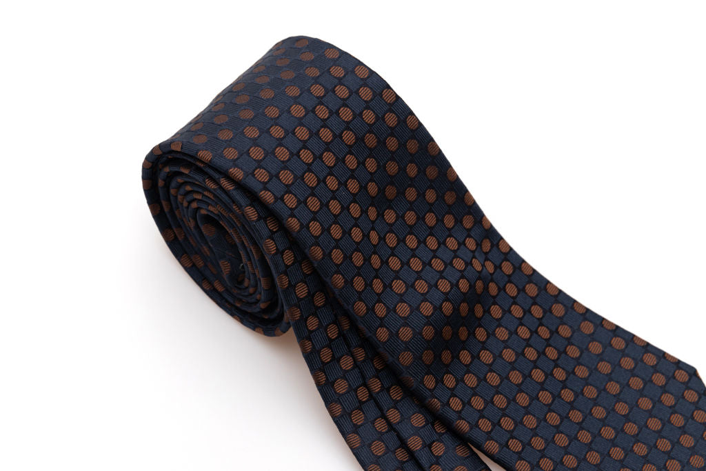 Cravatta blu con pois marrone in pura seta