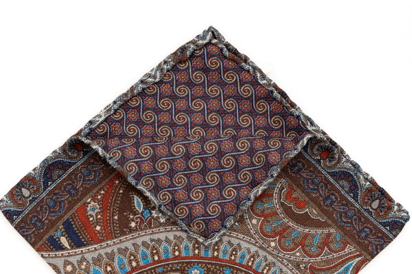 Beige clutch bag with red and blue pattern in pure silk