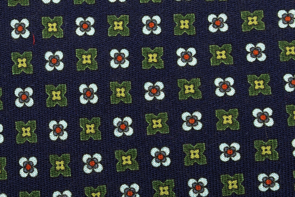 Blue base tie with geometric pattern pure wool