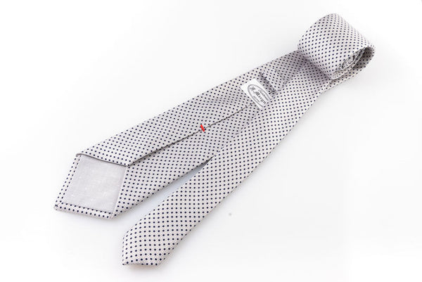 Ice grey tie with blue and white polka dots
