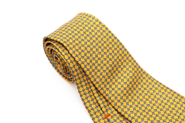 Cravatta giallo ocra con fantasia geometrica 100% seta