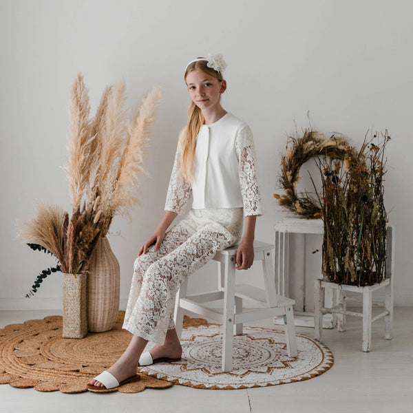 PANTALONI FLARED IN PIZZO
