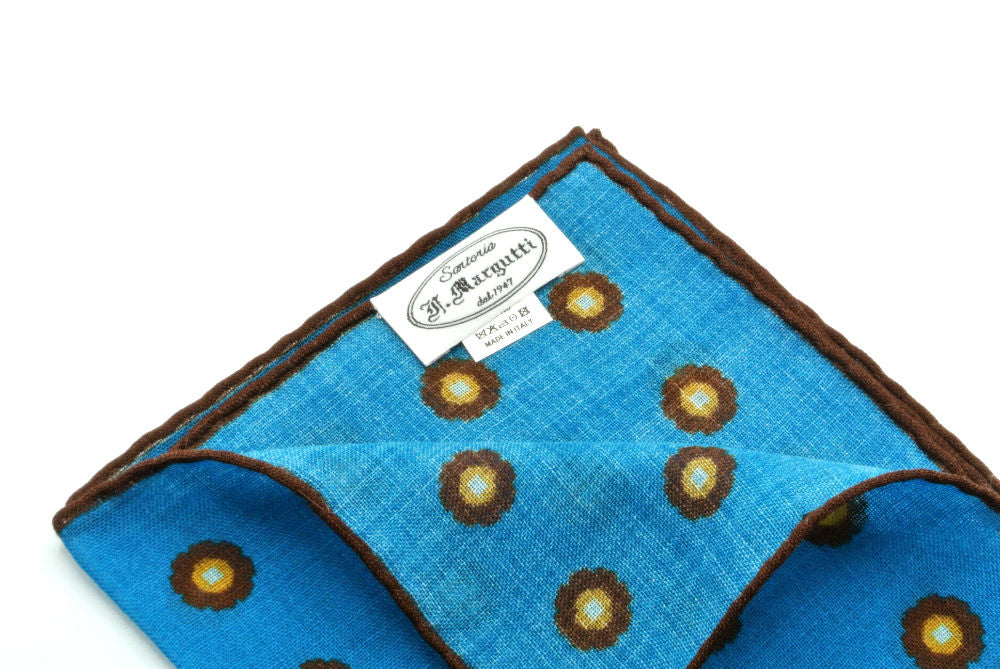 Turquoise clutch bag in pure wool