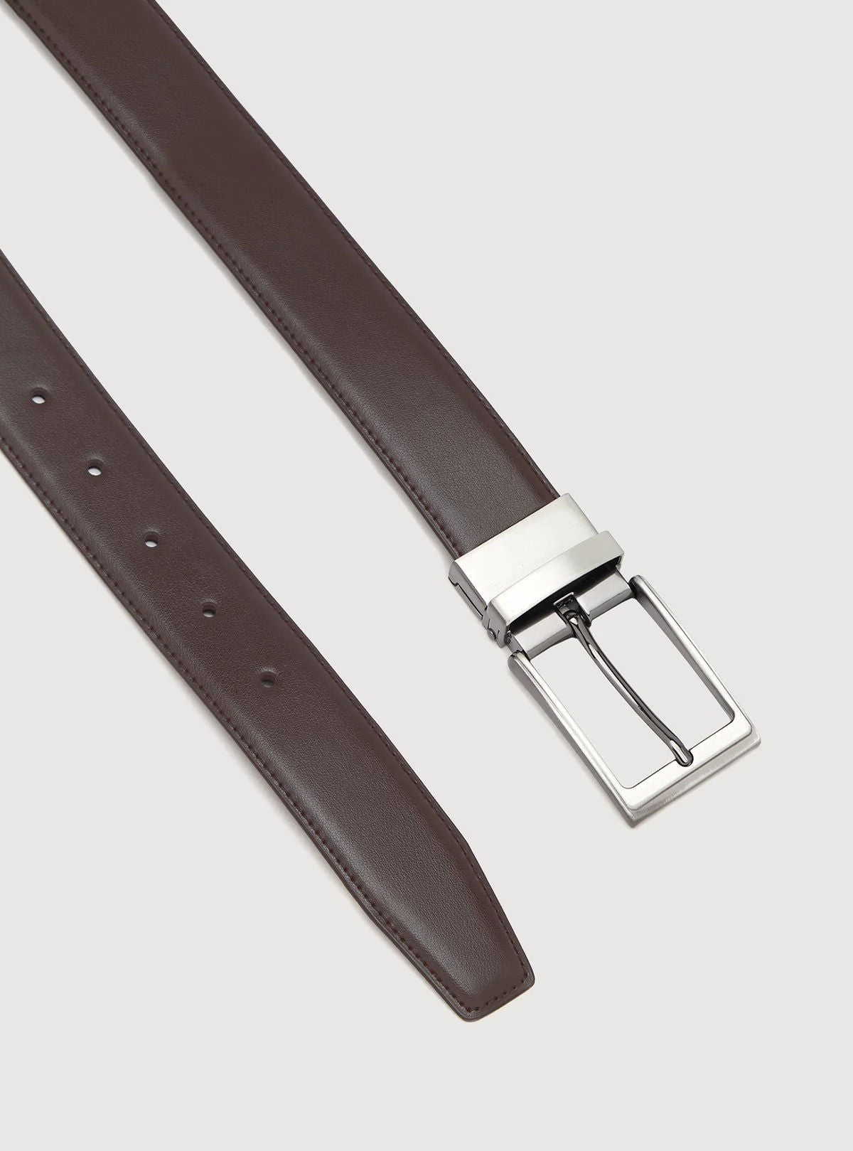 Cintura in pelle double face.
