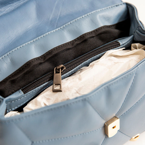 MUSA - quilted nappa leather bag with air force studs