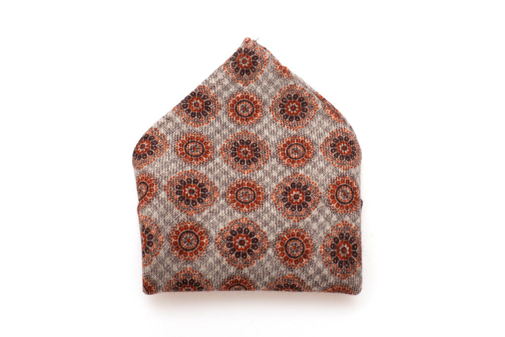 Orange patterned clutch bag in pure wool