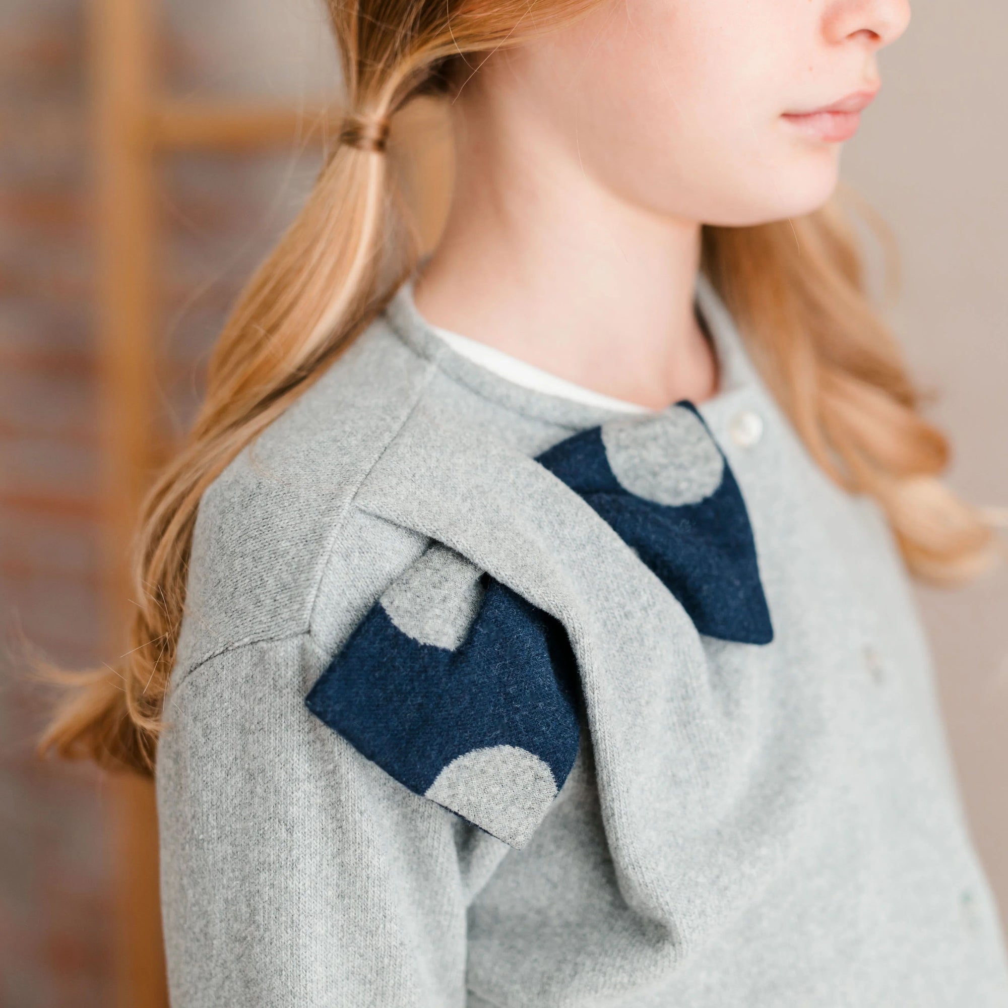 CARDIGAN CON FIOCCO FANTASIA POIS